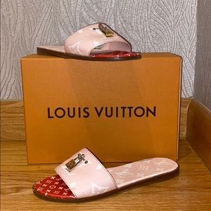 Preowned Louis Vuitton Lock it Flat mule
